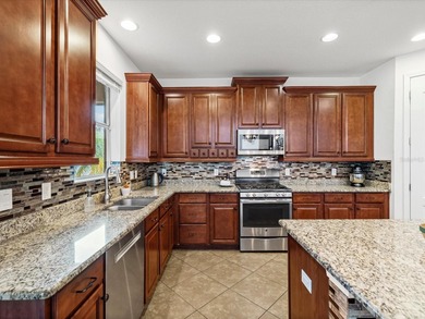 Welcome to this spacious 5 bedroom 4 bath home that sits on a on Diamond Hill Golf and Country Club in Florida - for sale on GolfHomes.com, golf home, golf lot