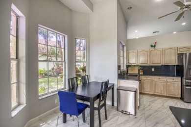 Located on a quiet cul-de-sac, this beautifully maintained home on Ibis Golf and Country Club in Florida - for sale on GolfHomes.com, golf home, golf lot