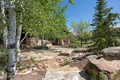 This stunning single-family residence offers 360-degree views of on Eagle Ranch in Colorado - for sale on GolfHomes.com, golf home, golf lot