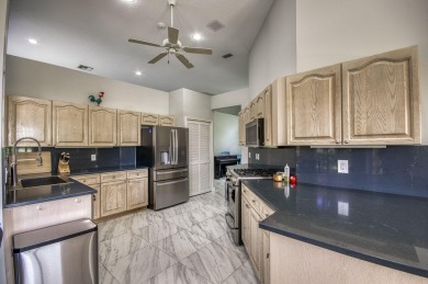 Located on a quiet cul-de-sac, this beautifully maintained home on Ibis Golf and Country Club in Florida - for sale on GolfHomes.com, golf home, golf lot