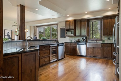 This stunning single-family residence offers 360-degree views of on Eagle Ranch in Colorado - for sale on GolfHomes.com, golf home, golf lot