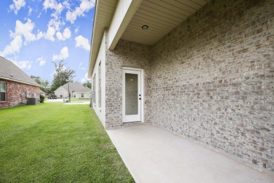 Situated in the prestigious Pelican Crossing subdivision on Pelican Point Golf Club in Louisiana - for sale on GolfHomes.com, golf home, golf lot