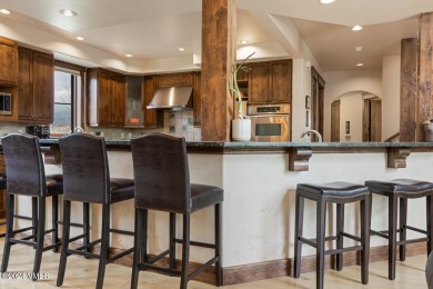 This stunning single-family residence offers 360-degree views of on Eagle Ranch in Colorado - for sale on GolfHomes.com, golf home, golf lot