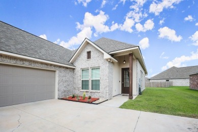 Situated in the prestigious Pelican Crossing subdivision on Pelican Point Golf Club in Louisiana - for sale on GolfHomes.com, golf home, golf lot