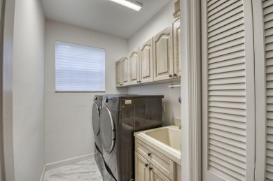 Located on a quiet cul-de-sac, this beautifully maintained home on Ibis Golf and Country Club in Florida - for sale on GolfHomes.com, golf home, golf lot
