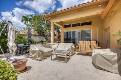 Located on a quiet cul-de-sac, this beautifully maintained home on Ibis Golf and Country Club in Florida - for sale on GolfHomes.com, golf home, golf lot