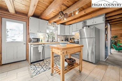 Turn-key, fully furnished mountain cabin just steps from the ski on Sugar Mountain Golf Course in North Carolina - for sale on GolfHomes.com, golf home, golf lot