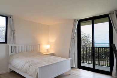 This spacious ocean end unit offers direct ocean views from its on Jupiter Dunes Golf Course in Florida - for sale on GolfHomes.com, golf home, golf lot