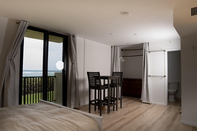 This spacious ocean end unit offers direct ocean views from its on Jupiter Dunes Golf Course in Florida - for sale on GolfHomes.com, golf home, golf lot