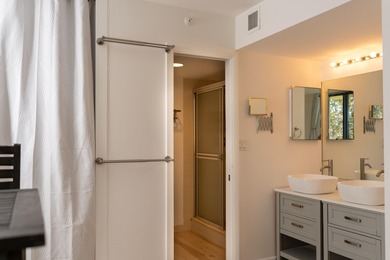 This spacious ocean end unit offers direct ocean views from its on Jupiter Dunes Golf Course in Florida - for sale on GolfHomes.com, golf home, golf lot