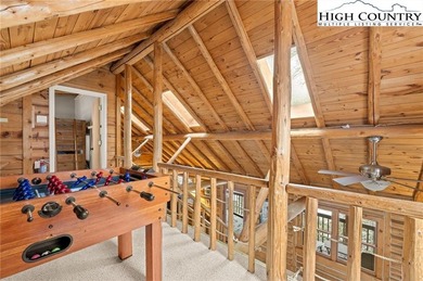 Turn-key, fully furnished mountain cabin just steps from the ski on Sugar Mountain Golf Course in North Carolina - for sale on GolfHomes.com, golf home, golf lot