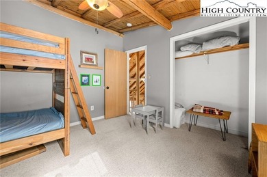 Turn-key, fully furnished mountain cabin just steps from the ski on Sugar Mountain Golf Course in North Carolina - for sale on GolfHomes.com, golf home, golf lot