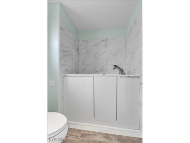 This beautifully maintained 2-bedroom, 2-bath home nestled in on Highland Falls Golf Club in Nevada - for sale on GolfHomes.com, golf home, golf lot