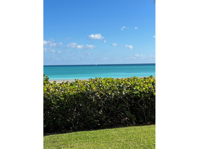 This spacious ocean end unit offers direct ocean views from its on Jupiter Dunes Golf Course in Florida - for sale on GolfHomes.com, golf home, golf lot