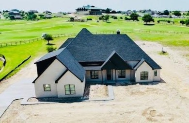 Stunning new construction home in the exclusive Canyon West Golf on Canyon West Golf Club in Texas - for sale on GolfHomes.com, golf home, golf lot