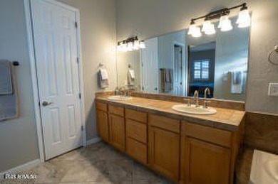 Located just off the 4th green of the Snowflake golf course on Snowflake Municipal Golf Course in Arizona - for sale on GolfHomes.com, golf home, golf lot