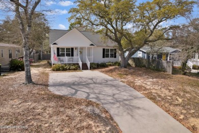 Imagine stepping into a charming getaway on Oak Island, NC on Founders Club At St. James Plantation in North Carolina - for sale on GolfHomes.com, golf home, golf lot