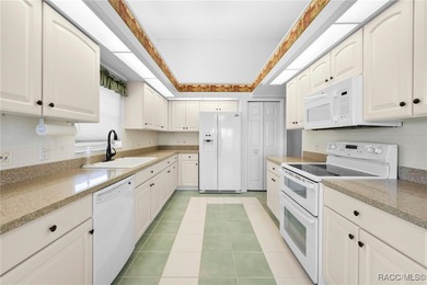 Discover refined golf-course living at 11231 Sun Tree Rd on Beacon Woods Golf Club in Florida - for sale on GolfHomes.com, golf home, golf lot