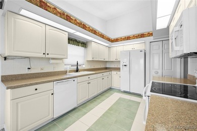 Discover refined golf-course living at 11231 Sun Tree Rd on Beacon Woods Golf Club in Florida - for sale on GolfHomes.com, golf home, golf lot