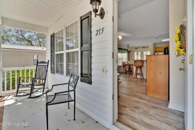 Imagine stepping into a charming getaway on Oak Island, NC on Founders Club At St. James Plantation in North Carolina - for sale on GolfHomes.com, golf home, golf lot