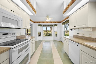 Discover refined golf-course living at 11231 Sun Tree Rd on Beacon Woods Golf Club in Florida - for sale on GolfHomes.com, golf home, golf lot