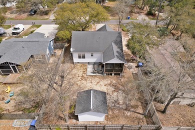 Imagine stepping into a charming getaway on Oak Island, NC on Founders Club At St. James Plantation in North Carolina - for sale on GolfHomes.com, golf home, golf lot