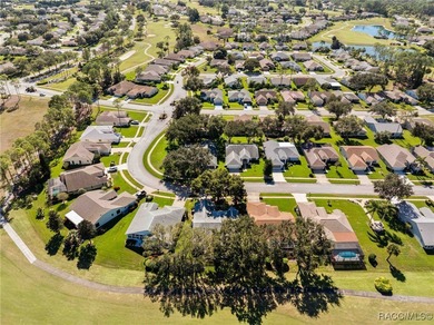 Discover refined golf-course living at 11231 Sun Tree Rd on Beacon Woods Golf Club in Florida - for sale on GolfHomes.com, golf home, golf lot