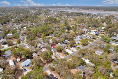 Imagine stepping into a charming getaway on Oak Island, NC on Founders Club At St. James Plantation in North Carolina - for sale on GolfHomes.com, golf home, golf lot