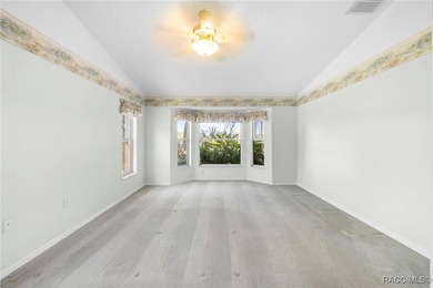 Discover refined golf-course living at 11231 Sun Tree Rd on Beacon Woods Golf Club in Florida - for sale on GolfHomes.com, golf home, golf lot