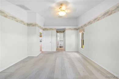 Discover refined golf-course living at 11231 Sun Tree Rd on Beacon Woods Golf Club in Florida - for sale on GolfHomes.com, golf home, golf lot