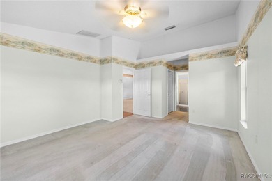 Discover refined golf-course living at 11231 Sun Tree Rd on Beacon Woods Golf Club in Florida - for sale on GolfHomes.com, golf home, golf lot