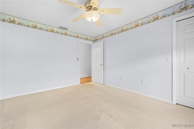 Discover refined golf-course living at 11231 Sun Tree Rd on Beacon Woods Golf Club in Florida - for sale on GolfHomes.com, golf home, golf lot