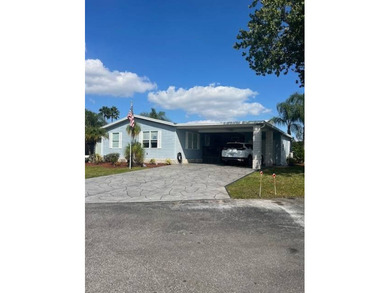 Stunningly updated and positioned in a gated, highly active 55+ on Hamptons Golf Club in Florida - for sale on GolfHomes.com, golf home, golf lot