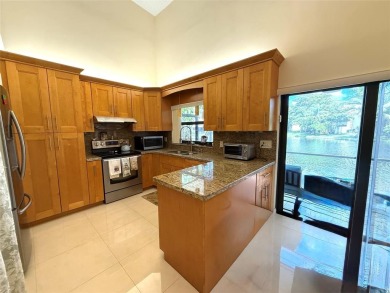 Rarely available, 3 bed/2 bath corner villa on a beautiful on Jacaranda Golf Club in Florida - for sale on GolfHomes.com, golf home, golf lot