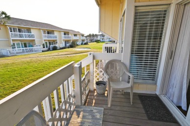 Nestled between the 9th hole and Hole 1 of Sandpiper Cove's golf on Sandpiper Cove Golf Course in Florida - for sale on GolfHomes.com, golf home, golf lot