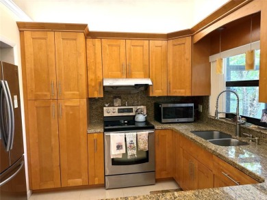Rarely available, 3 bed/2 bath corner villa on a beautiful on Jacaranda Golf Club in Florida - for sale on GolfHomes.com, golf home, golf lot