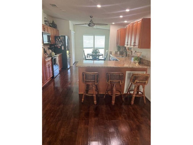 Stunningly updated and positioned in a gated, highly active 55+ on Hamptons Golf Club in Florida - for sale on GolfHomes.com, golf home, golf lot