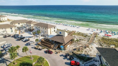 Nestled between the 9th hole and Hole 1 of Sandpiper Cove's golf on Sandpiper Cove Golf Course in Florida - for sale on GolfHomes.com, golf home, golf lot