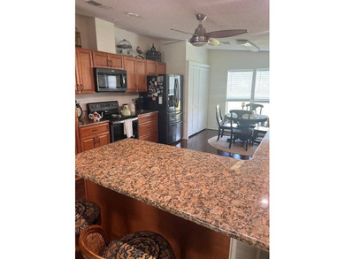 Stunningly updated and positioned in a gated, highly active 55+ on Hamptons Golf Club in Florida - for sale on GolfHomes.com, golf home, golf lot