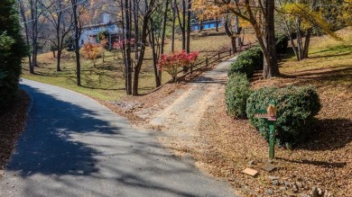 Nestled in the beautiful Mill Creek Country Club, this on Mill Creek Country Club in North Carolina - for sale on GolfHomes.com, golf home, golf lot