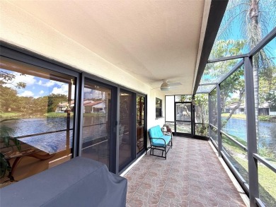 Rarely available, 3 bed/2 bath corner villa on a beautiful on Jacaranda Golf Club in Florida - for sale on GolfHomes.com, golf home, golf lot