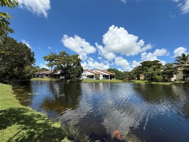 Rarely available, 3 bed/2 bath corner villa on a beautiful on Jacaranda Golf Club in Florida - for sale on GolfHomes.com, golf home, golf lot