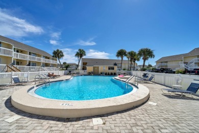 Nestled between the 9th hole and Hole 1 of Sandpiper Cove's golf on Sandpiper Cove Golf Course in Florida - for sale on GolfHomes.com, golf home, golf lot