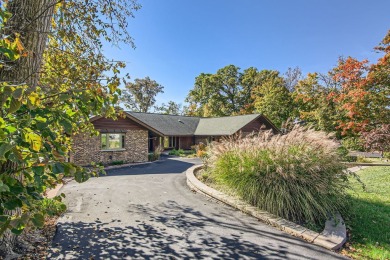 You will love this sprawling hillside ranch with a walk out on Prestwick Country Club in Illinois - for sale on GolfHomes.com, golf home, golf lot