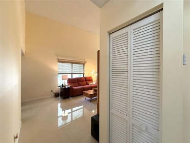 Rarely available, 3 bed/2 bath corner villa on a beautiful on Jacaranda Golf Club in Florida - for sale on GolfHomes.com, golf home, golf lot