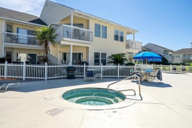 Nestled between the 9th hole and Hole 1 of Sandpiper Cove's golf on Sandpiper Cove Golf Course in Florida - for sale on GolfHomes.com, golf home, golf lot