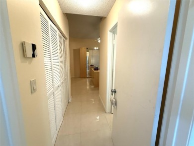 Rarely available, 3 bed/2 bath corner villa on a beautiful on Jacaranda Golf Club in Florida - for sale on GolfHomes.com, golf home, golf lot