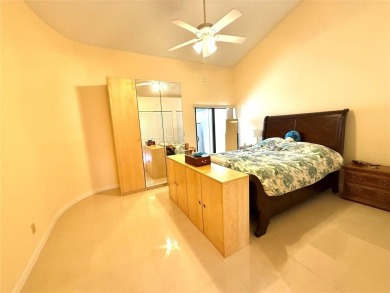 Rarely available, 3 bed/2 bath corner villa on a beautiful on Jacaranda Golf Club in Florida - for sale on GolfHomes.com, golf home, golf lot