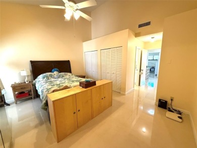 Rarely available, 3 bed/2 bath corner villa on a beautiful on Jacaranda Golf Club in Florida - for sale on GolfHomes.com, golf home, golf lot