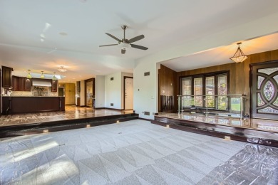 You will love this sprawling hillside ranch with a walk out on Prestwick Country Club in Illinois - for sale on GolfHomes.com, golf home, golf lot